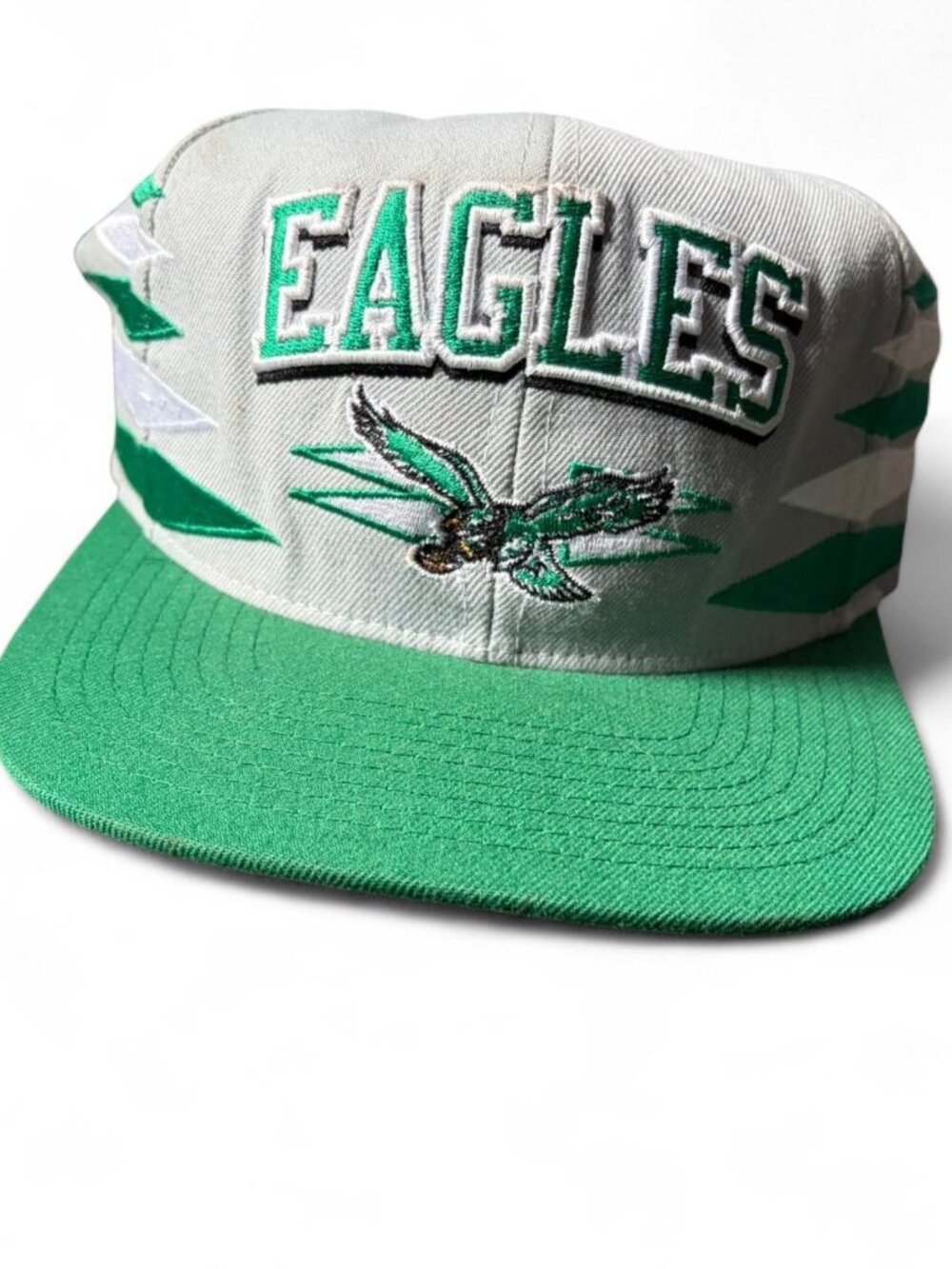 NFL Philadelphia Eagles snapback cap with green eagle logo and 'EAGLES' text
